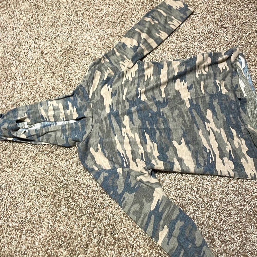 A camouflage sweater